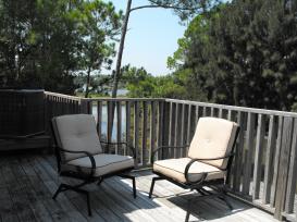 Enjoy the low country living from your balcony at Bayou Cottage.